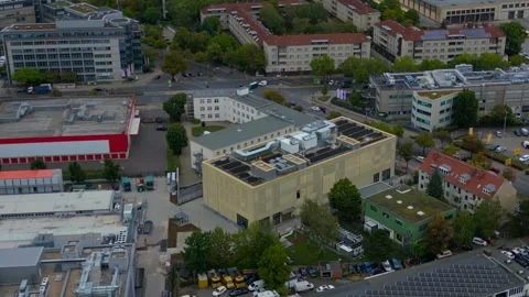 City data center building using solar cooling system. Smooth aerial view drone Stock Footage 345336525