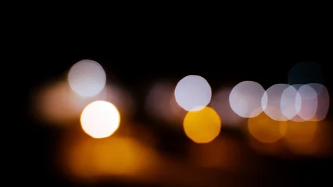The city dissolves in the evening lights. Nocturne perspective of urban lights Stock Footage 121969917