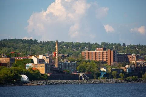 City of Duluth with buildings of Fitger's Brewhouse and St. Luke's Hospital agai Stock Photos