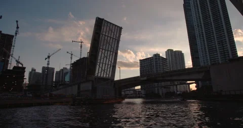 City at Dusk through Bridge in Brickell Miami Stock Footage 159236793
