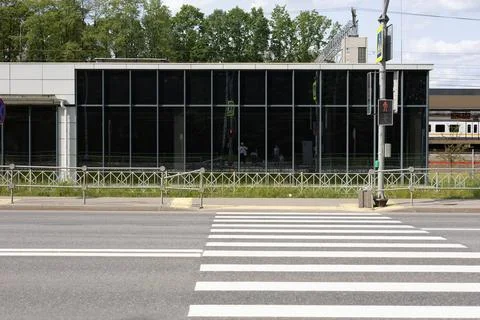 City empty pedestrian crossing through a wide highway. Striped empty pedestrian Stock Photos