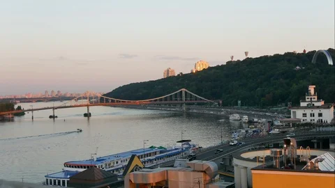 City Evening timelapse of sunset on river with boats, Kyiv, Ukraine Stock Footage 93607925