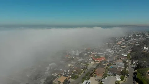 City exposed as clouds move by Stockbeeldmateriaal 221375349