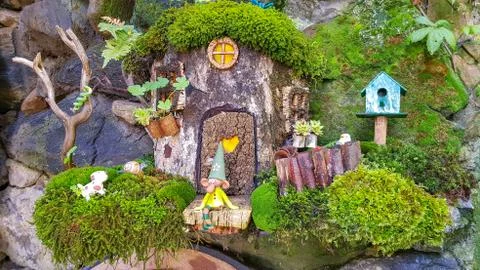City of gnomes in the forest made by hand, with moss and tree barks. Stock Photos