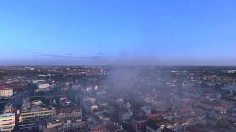 City infrastructure arson attack with smoke plume. Magic aerial view drone 動画素材 345230725