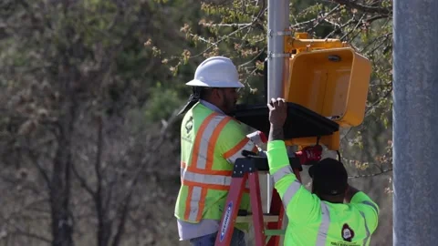 City infrastructure maintenance performed by workers. Stock Footage 172318818