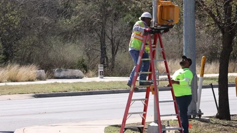 City infrastructure maintenance performed by workers. Stock Footage 172318870