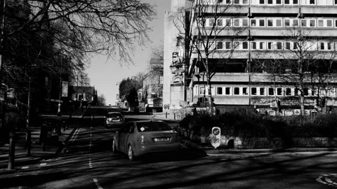 A city intersection with moving traffic Video stock 171800726