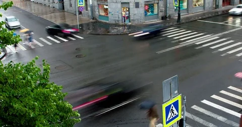 City Intersection in the Rain 4K Stock Footage 78130284
