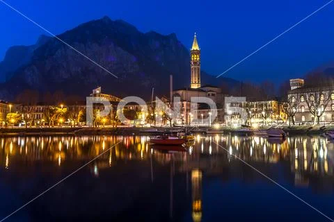 The city of Lecco at night, Lake Como Stock Photos