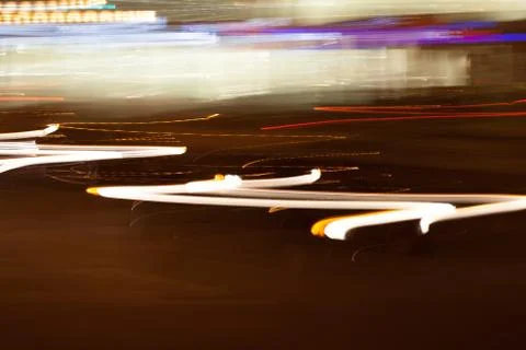 City lights diffused in long exposer and camera movement Stock Photos