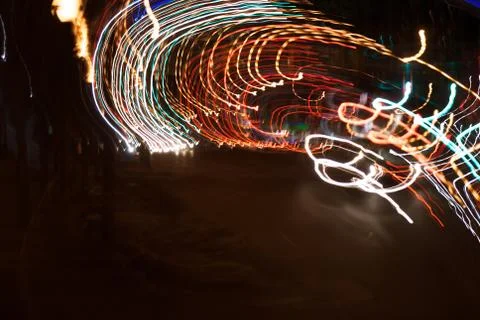 City lights diffused in long exposer and camera movement Stock Photos