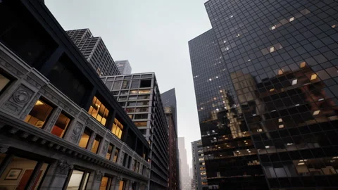City lights flicker as architect envisions future designs during evening walk Stock Footage 334343080