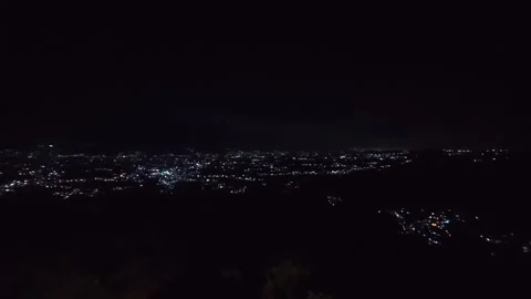 City Lights View from a Hill at Night Stock Footage 344866293