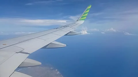 City Link Plane Fly Over Blue Sea Stock-Footage 259944712