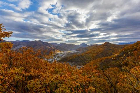 A city located between steep cliffs. Stock Photos
