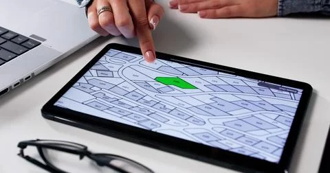 City Manager Using GIS Software To Plan Urban Development Projects Stock Photos