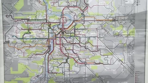 City Map Reflections. Transit Map Displayed Behind Reflective Glass Surface Stock Footage 327920358