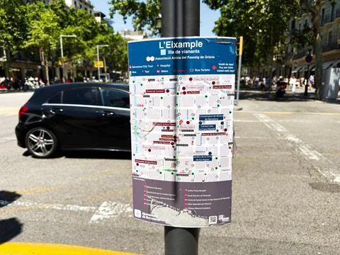 City map sign on a pole in L'Eixample Barcelona Spain showing tourist route.. Stock Photos