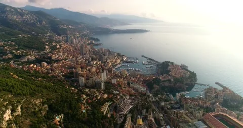 The city of Monaco under the sunset. We can see the Mediterranean Sea all over t Vídeos de archivo 154693728