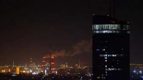 City by night industrial long shot Stock Footage
