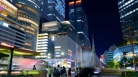 City at Night in Japan - Busy Intersection - Meieki, Nagoya - Timelapse 4K Stock Footage 99780502