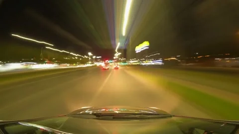 City at night from the perspective of a car driver, timelapse of night drivin Stock Footage 202065668