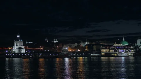 City at night with reflection in water Stock Footage 88084760