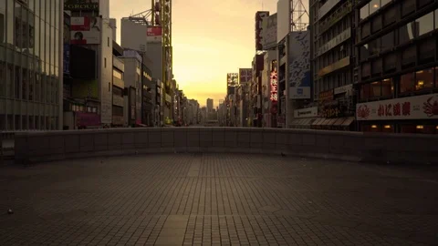 The city of Osaka, Japan is waking up on a sunny Sunday morning, view from Stock Footage