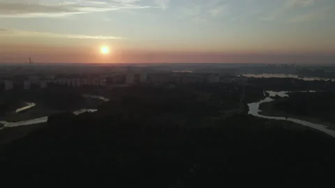 City park, the river flows. Shot at dawn, at sunrise. Aerial photography. Stock Footage 158736799