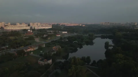 City park, the river flows. Shot at dawn, at sunrise. Aerial photography. Stock Footage 158736845
