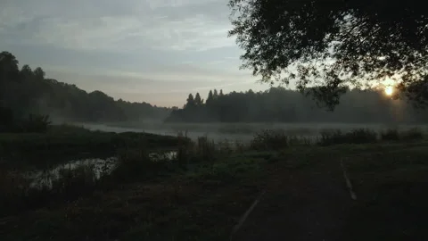 City park, the river flows. Shot at dawn, at sunrise. Aerial photography. Stock Footage 158737823