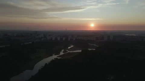 City park, the river flows. Shot at dawn, at sunrise. Aerial photography. Stock Footage 158739071