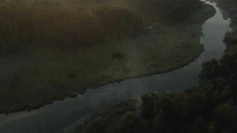 City park, the river flows. Shot at dawn, at sunrise. Aerial photography. Stock Footage 158739269