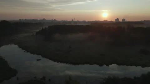 City park, the river flows. Shot at dawn, at sunrise. Aerial photography. Stock Footage 158739561