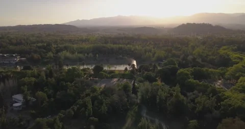 City Park Sunset: A Drone's View of Urban Twilight Stock Footage 274364317