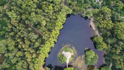 City Park view from the top. Triangular pond with gazebo in the center Stock Footage 112877910