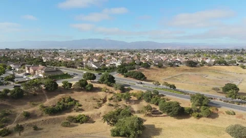City park with winding paths and dry patches in Salinas, aerial Stock Footage 313467007
