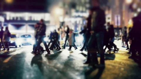 City pedestrians on winter night, cross street, slow motion 100p Stock Footage