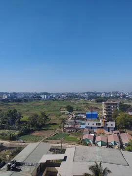 City Raw Horizontal Image With Fields and Buildings Stock Photos