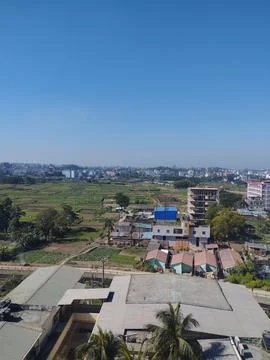 City Raw Image With Fields and Buildings Stock Photos