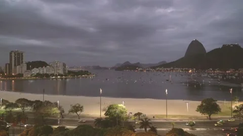 The city is reflected in the bay at dusk Stock-Footage 312482322