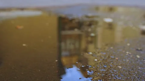 The city is reflected in the puddle Video stock 273008101