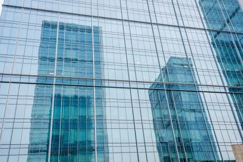City reflection in skyscraper windows in Chengdu, China Stock Photos