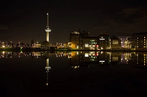 City reflection in water at nighttime timelapse Stock Footage 72591016