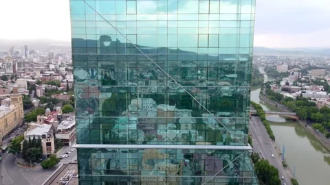 City reflections in the glass skyscraper Stock Footage 168613622