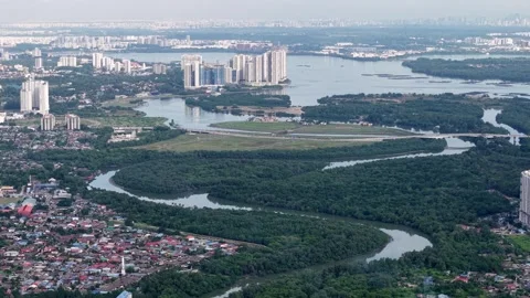 City with a river running through it at Johor Bahru Video stock 329348051