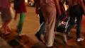 City road crossing, night, children, soldiers, bicycle, old aged, running people HD Footage