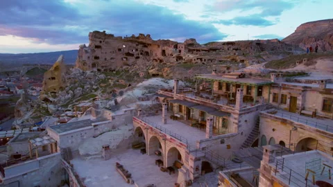 City in the Rocks of Cappadocia at sunset Stock Footage 254703905