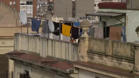 City rooftops laundry hanging to dry Stock Footage 73896512